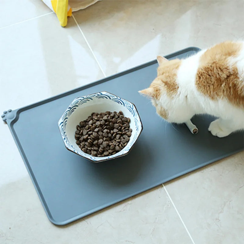 Pet Cat Bowl Food Mat with High Lips Silicone Non-Stick Waterproof DogSPECIFICATIONSBrand Name: NoEnName_NullItem Type: BowlsOrigin: Mainland ChinaType: DogsMaterial: latexname1: Dog Cat Feeding Matname2: Dog Cat Bowl Matname3: SiliconShopDoggieworksShopDoggieworks-Stick Waterproof Dog Food Feeding Pad Puppy Feeder Tray Water Cushion Placemat